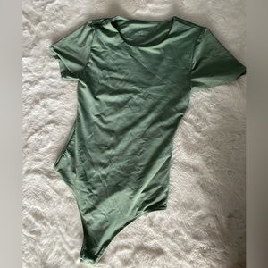 Pastel/ pale green t-shirt bodysuit, thick fabric